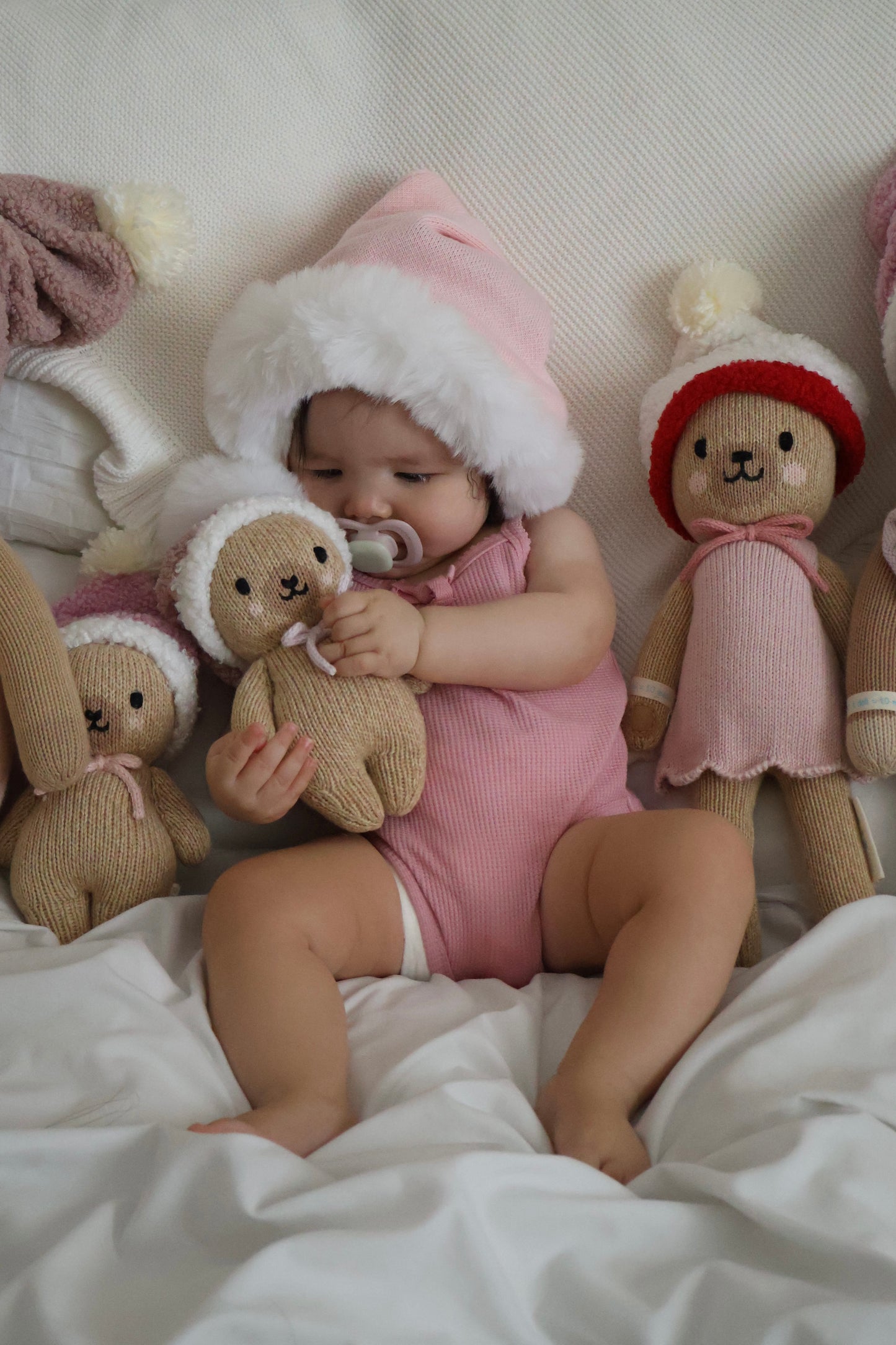 Cuddle and kind dolls santa hats